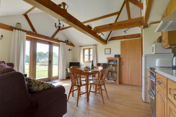 Living area showing wooden floor