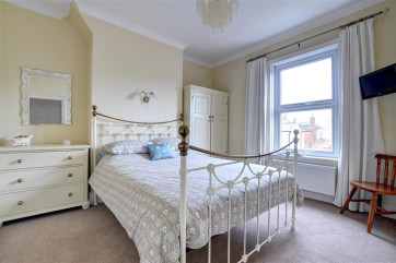 Characterful Bedroom with king-sized bed.