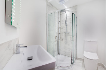The double bedroom ensuite benefits from a luxurious bath, separate walk in shower and basin and wc 