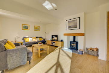 Sitting Room showing woodburner and seating