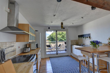 The kitchen has a handy breakfast bar area making cooking a real social event!