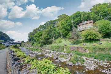 A spacious and attractive apartment offering wonderful river and hillside views
