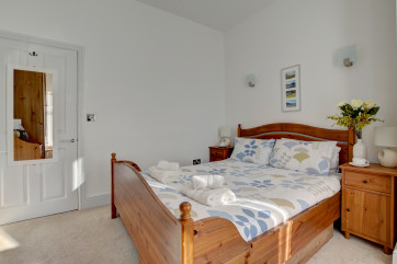 The master bedroom with pine furniture