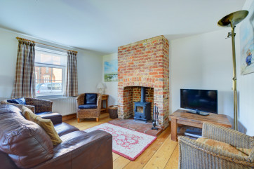 Attractively furnished with comfortable seating and a  woodburner, perfect space to relax