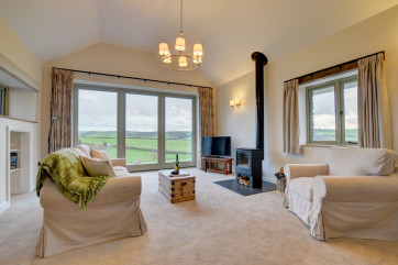Beautifully decorated sitting room with stunning countryside views