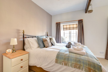 Snuggle up in the lovely, cosy bed after a day exploring the Dales.