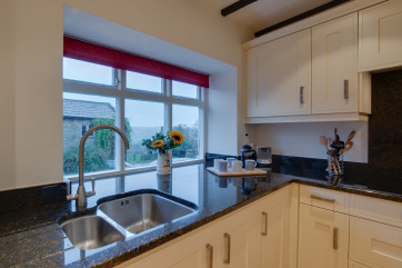 Well equipped kitchen with views down the valley