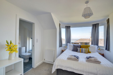 Master bedroom with beautiful views and ensuite bathroom