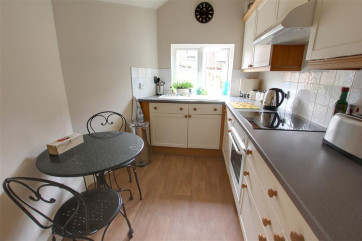 Very pretty room, well designed and even space for a bistro table.