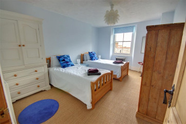 The Twin bedroom is spacious with wonderful sea views.