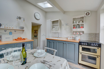 Well appointed kitchen and dining room 