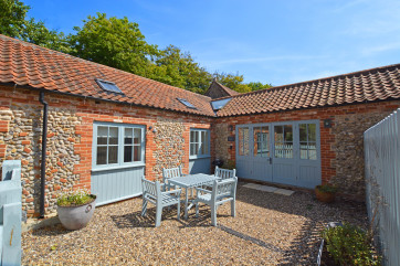 Exterior with outdoor table and chairs