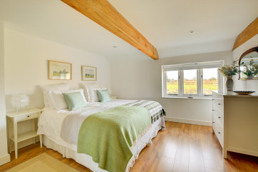 With stunning views over the grounds.