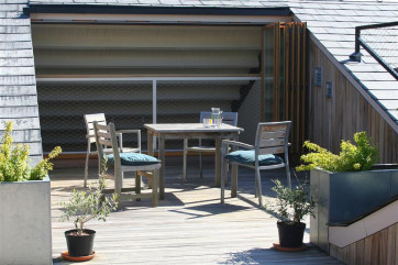 In the summer months why not have a drink outside on this rooftop terrace. 