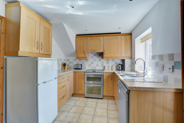 Modern, bright, contemporary kitchen with the added benefit of a shared utility room and a ground floor WC
