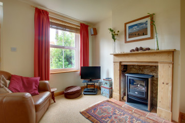 In the sitting room there is a TV with Freeview together with a DVD for family entertainment