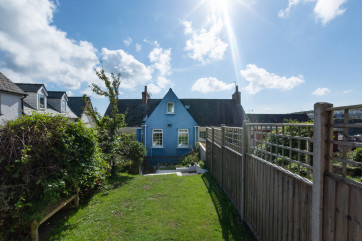 Woodbine Cottage has a landed garden.