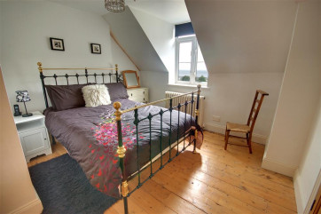Bedroom 3 with Double iron bedstead is situated on the second floor.