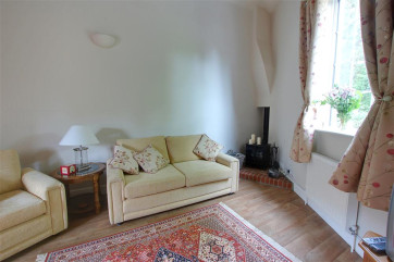 Very comfortable suite and wood burner tucked in the corner for winter warmth.....