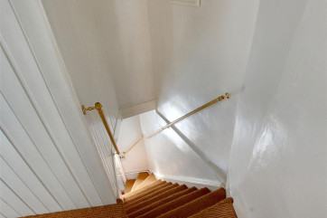 Fairly steep staircase to the first floor.