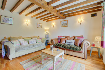 Comfortable seating in this delightfully cosy sitting room