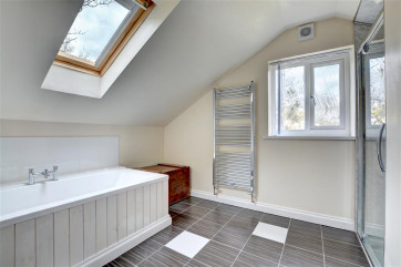 First floor family bathroom with spearate shower