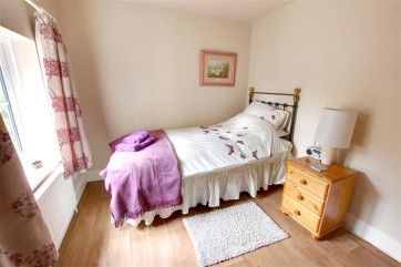 The stacker bed makes the most of the available space in this sunny room.