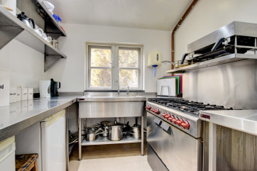 Fully fitted kitchen, large fridge freezer and plenty of storage.