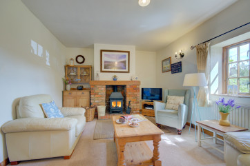 This property has a delightful cosy sitting room with woodburner