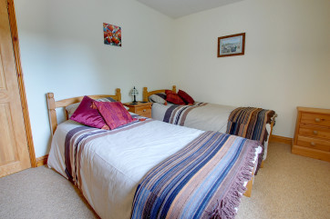 The pretty double room has twin beds, ideal for children 