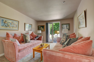 Sitting Room with comfortable seating, coffee table