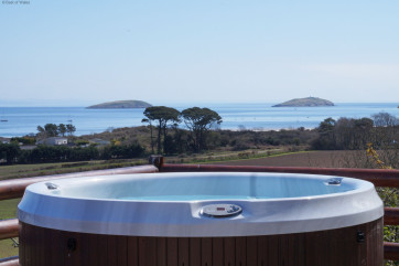 Stunning view from the hot tub towards the coast and Abersoch