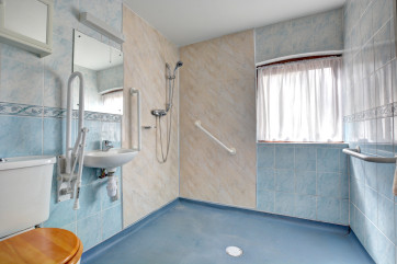Shower/Wet Room with wheel-in shower, washbasin and wc - equipped for the less able 