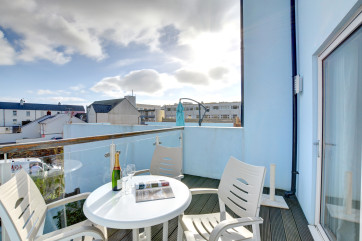 Use of the sun terrace at this delightful holiday apartment.