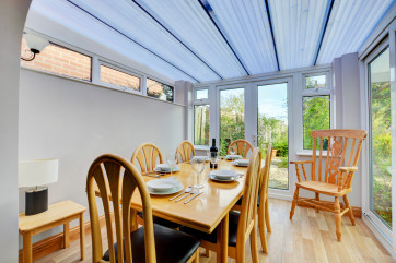 This property benefits from a lovely conservatory with additional dining
