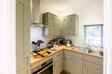 Kitchen with fitted units & built in oven