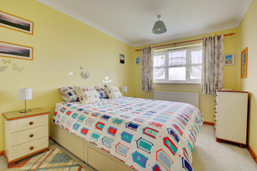 Colourful and comfortable double bedroom.