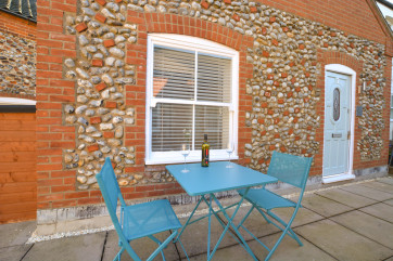 Patio with outdoor table and chairs