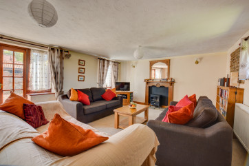 With lots of comfy sofas and lots of space, this would make an ideal family room