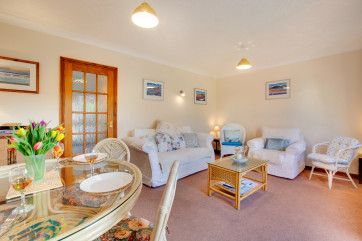 The sitting room is a large and welcoming space to enjoy your break