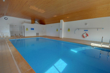 Indoor heated swimming pool with kiddies corner.