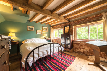 A double bedded room with pretty views over the mill pond