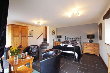 Armchairs and coffee table for your morning coffee.