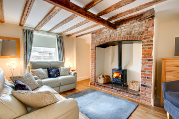 Comfortable seating around the log burner, for cosy nights in watching the tv/DVD player or listening to CDs or the radio.