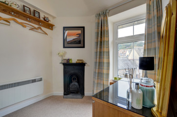 Dressing table and feature fireplace in the bedroom