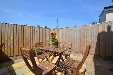 Patio area with table and chairs