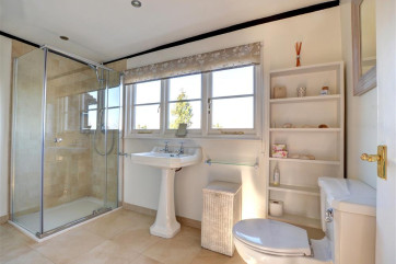 A wonderful bathroom with separate shower and bath