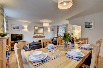 The large dining table is perfect for family meals together