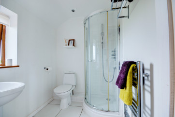 Modern and bright shower room with shower cubicle