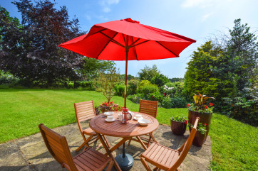 Stunning views across the lawned gardens and beyond.